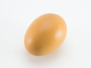 Chicken brown egg on a white isolated background. The best quality.