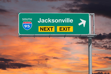 Jacksonville Florida route 95 freeway next exit sign with sunset sky.