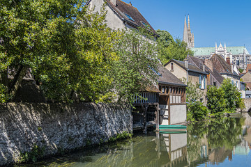 Scenic view of Eure River banks and houses in Historic Center of Chartres. Chartres, Eure-et-Loir...