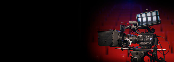 Digital video camera banner, movie theater background with light of the projector