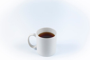 Cup of Black Coffee in plain wite cup with white background