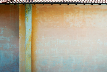 grunge color painted wall of old house.