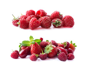 Ripe red berries isolated on white background.Juicy and delicious raspberries, strawberries and dogwoods. Background of mix fruits with copy space for text. Red berries and fruits.