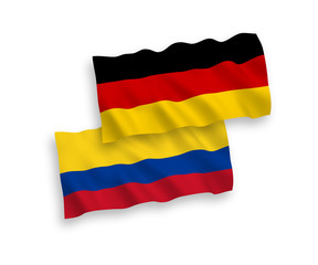 Flags of Colombia and Germany on a white background