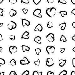 Seamless pattern with hand drawn hearts