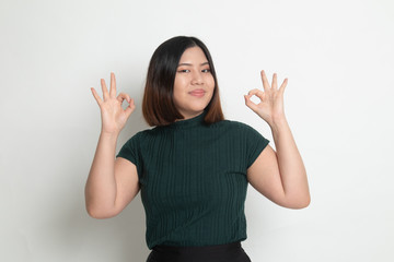 Asian woman show double OK hand sign  and smile