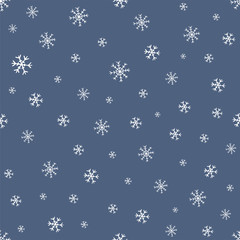 Seamless pattern vector with cute snowflakes on a blue background. Happy New Year and Christmas hand drawn doodle icons for design cards, invitations, wallpaper, wrapping paper