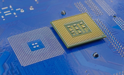 computer processor on blue motherboard circuit