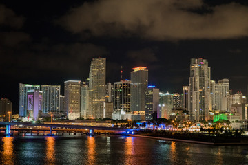 Miami city skyline panorama at dusk with urban skyscrapers