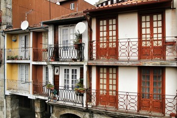 Old colorful tiled facades in Porto city