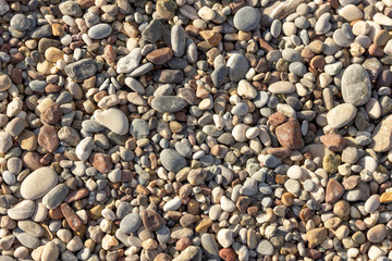 Multicolor of pebble stones texture background, can use for wallpaper decoration, vintage style. surface of gravel stone pattern.