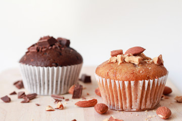 Almonds cupcakes homemade with Chocolate cupcake  on a cutting board.