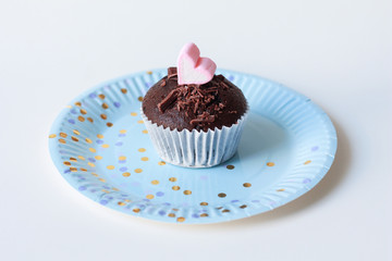 cupcake with icing and sprinkles