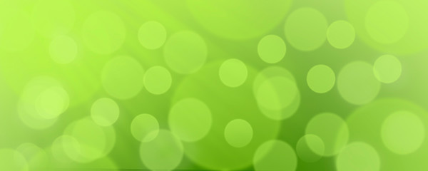 Fototapeta premium Abstract green background with bokeh - Christmas or spring concept - blurry circles bokeh on biscay green background
