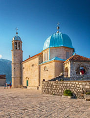 Fototapeta na wymiar View on the Church of Mary on the reef in Perast, Montenegro