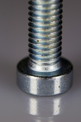 Close-up of a screw head with dirty edge