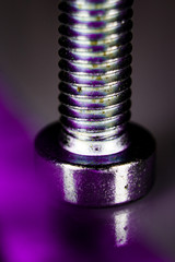 Close-up of a screw head with dirty edge
