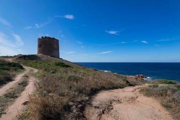 Fototapeta na wymiar Tower of Red Island in Sardinia