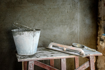 Tools for plaster on construction site.
