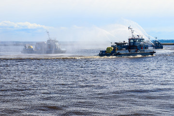 Extinguishing a burning ship during naval exercises