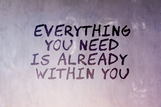 Motivation and inspirational quotes - Everything you need is already within you. Blurry background.