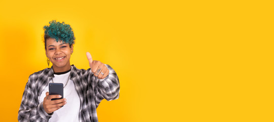 girl with megaphone isolated on color background