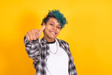 isolated girl with gesture of satisfaction and approval isolated on color background