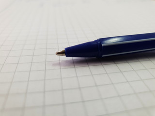 Pen on a sheet of paper