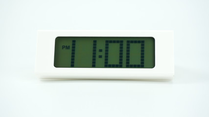 Digital alarm White clock time 11.00 pm. on white background, Time concept..