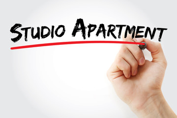 Fototapeta premium Studio apartment text with marker, concept background