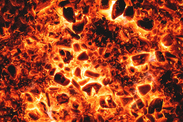 Hot burning coal texture background.