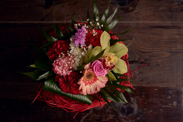 Detail Of Flower Bouquet With wood On The Background