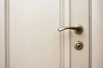 Grey door to the house, door handle, copy space