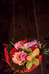 Detail Of Flower Bouquet With wood On The Background