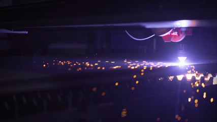 A machine using nitrogen and a laser burns thick metal. Thick metal laser cutting. cutting metal...