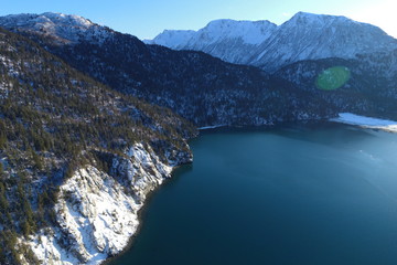 Snow covered cliffs of Halibut Cove