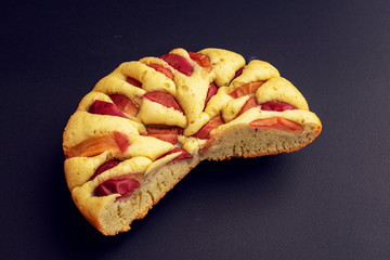 Delicious Apple pie on black background, top view