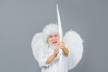Arrow of love. Male angel with bow and arrow. Cupid angel with bow and arrows. Cupid in valentine...