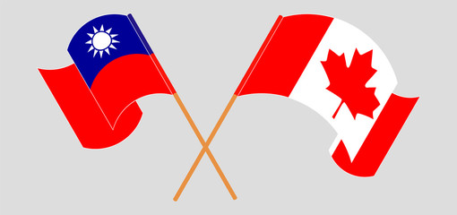 Crossed and waving flags of Taiwan and Canada