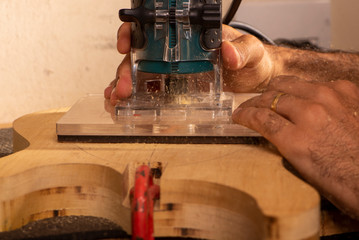 luthier working in his workshop