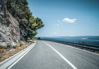 Country highway on a summer day. The effect of tinting HDR.