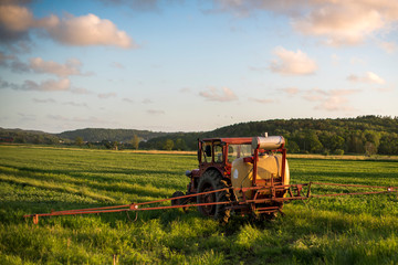 combine harvester working on wheat field