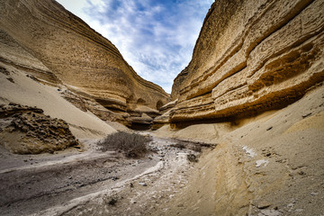 Weathered rock formations in the Canyon de los Perdidos. Nazca Desert, Ica, Peru