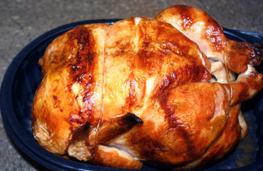 Delicious crispy whole roasted chicken just out of the oven