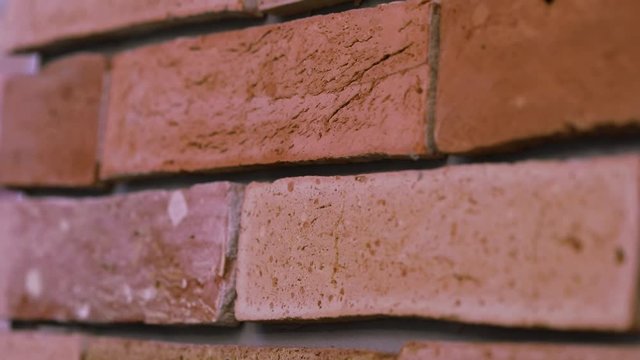 Red brick wall, close-up of a brick wall