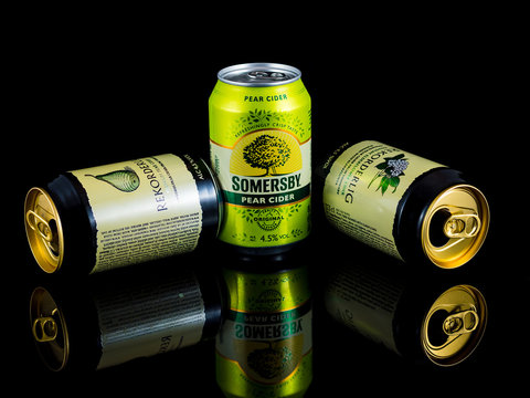 Heidelberg, germany - december 10, 2015 - cans of cider isolated on black