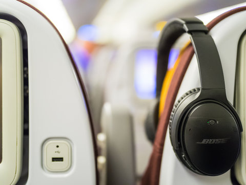 Frankfurt, Germany - Circa November 2016 - Noise cancellation headphones in the airplane