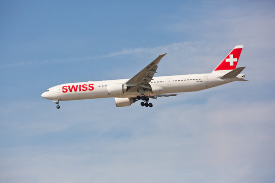 Chicago, USA - September 15, 2019: Swiss airline Boeing 777-300 on final approach to O'Hare International Airport. Swiss is the national airline of Switzerland.