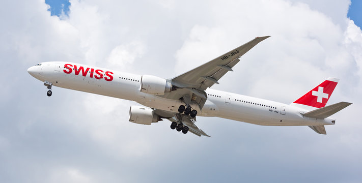 Chicago, USA - July 16, 2018: Swiss airline Boeing 777 aircraft on final approach to O'Hare International Airport. Swiss is the national airline of Switzerland.
