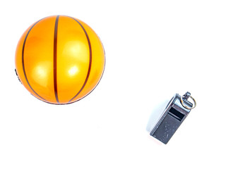 Basketball ball and referee whistle on a white background. Sport. Tote. Background image. Place for...